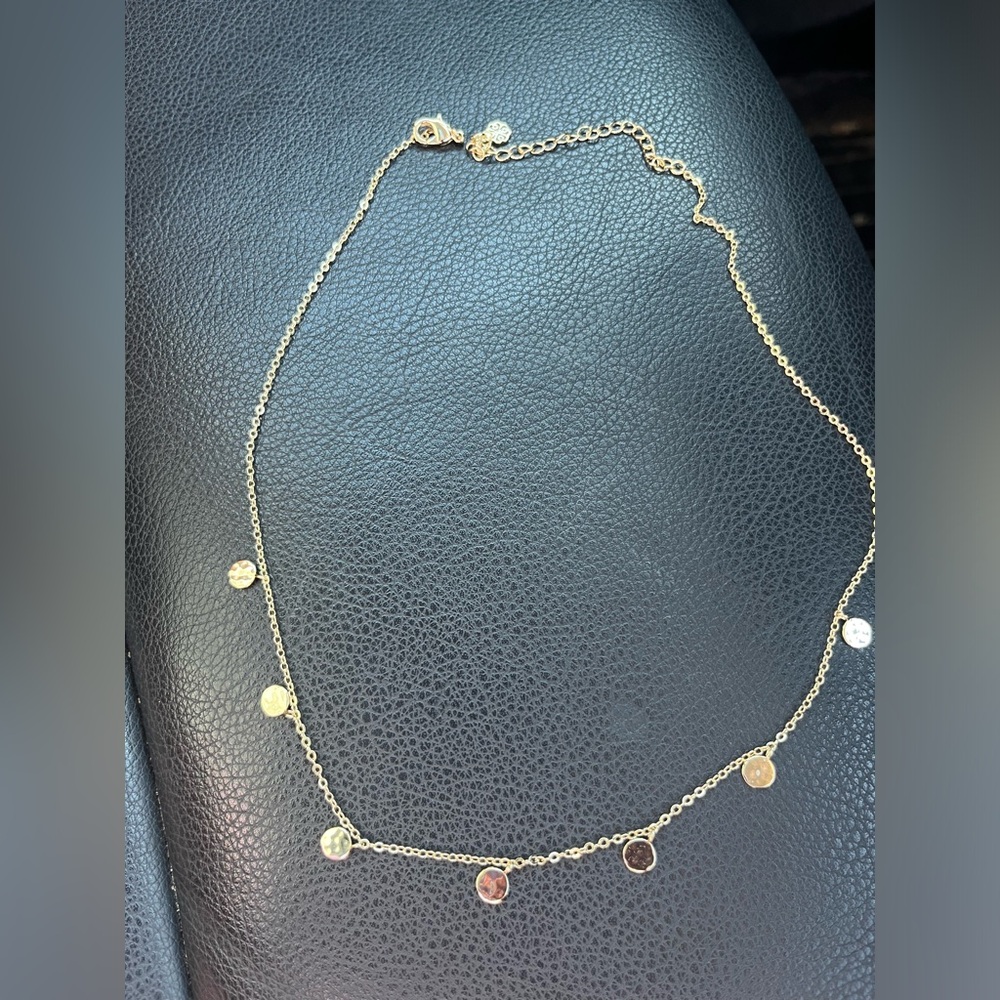 Gold plated necklace that has never been worn. Has 3 inch extender.